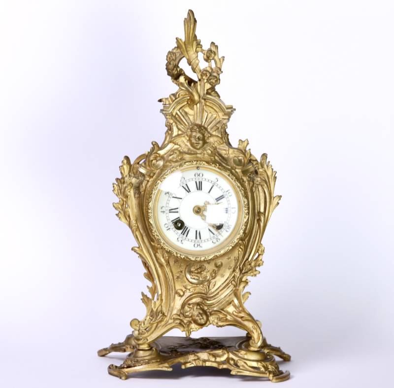 Pendule ancienne en bronze dorée