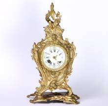 Pendule ancienne en bronze dorée